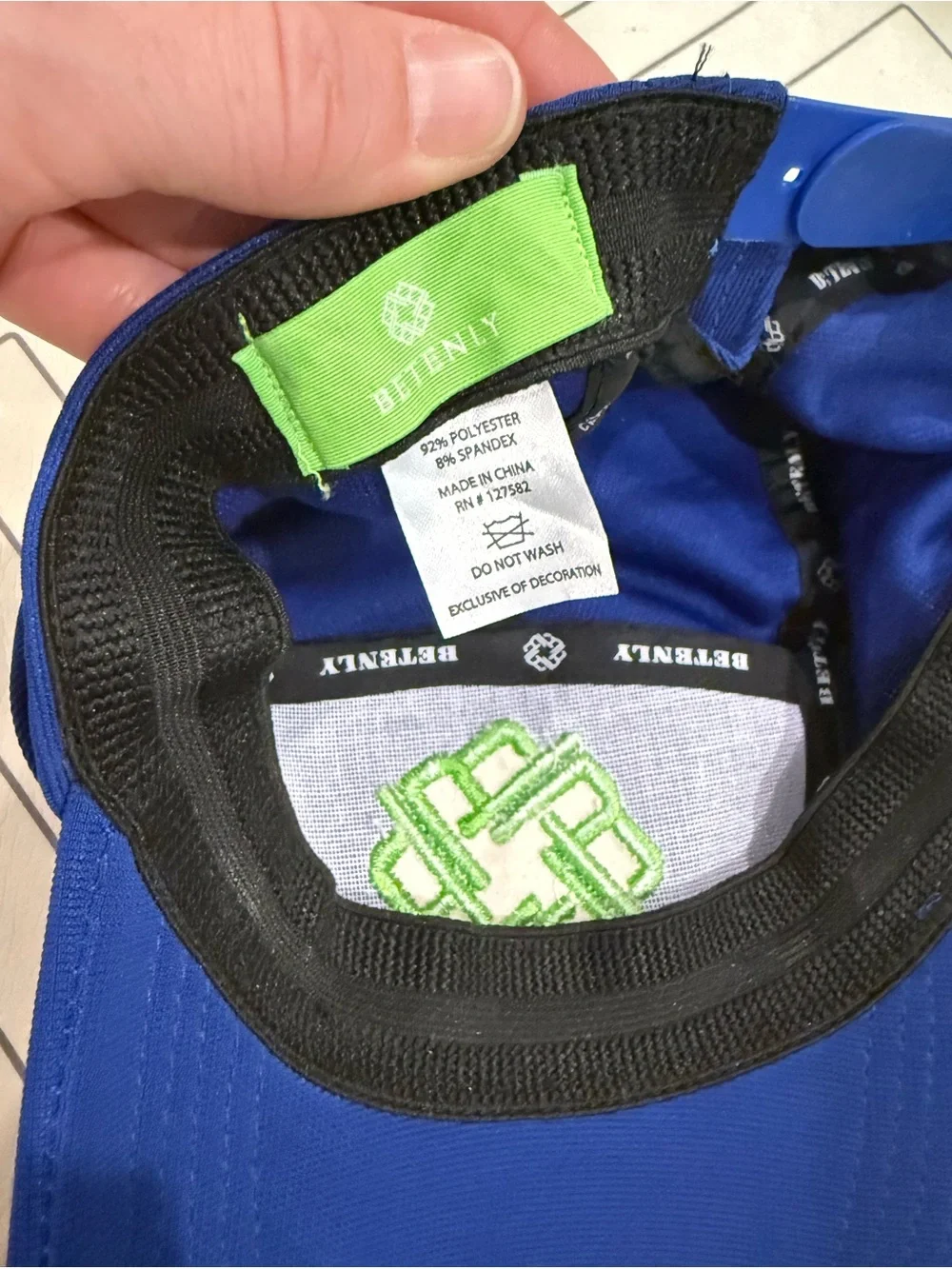 Betenly Blue Athletic Cap with Neon Green Knot Logo